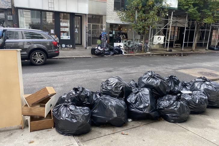 Fresh trash along a sidewalk in the Lower East Side.